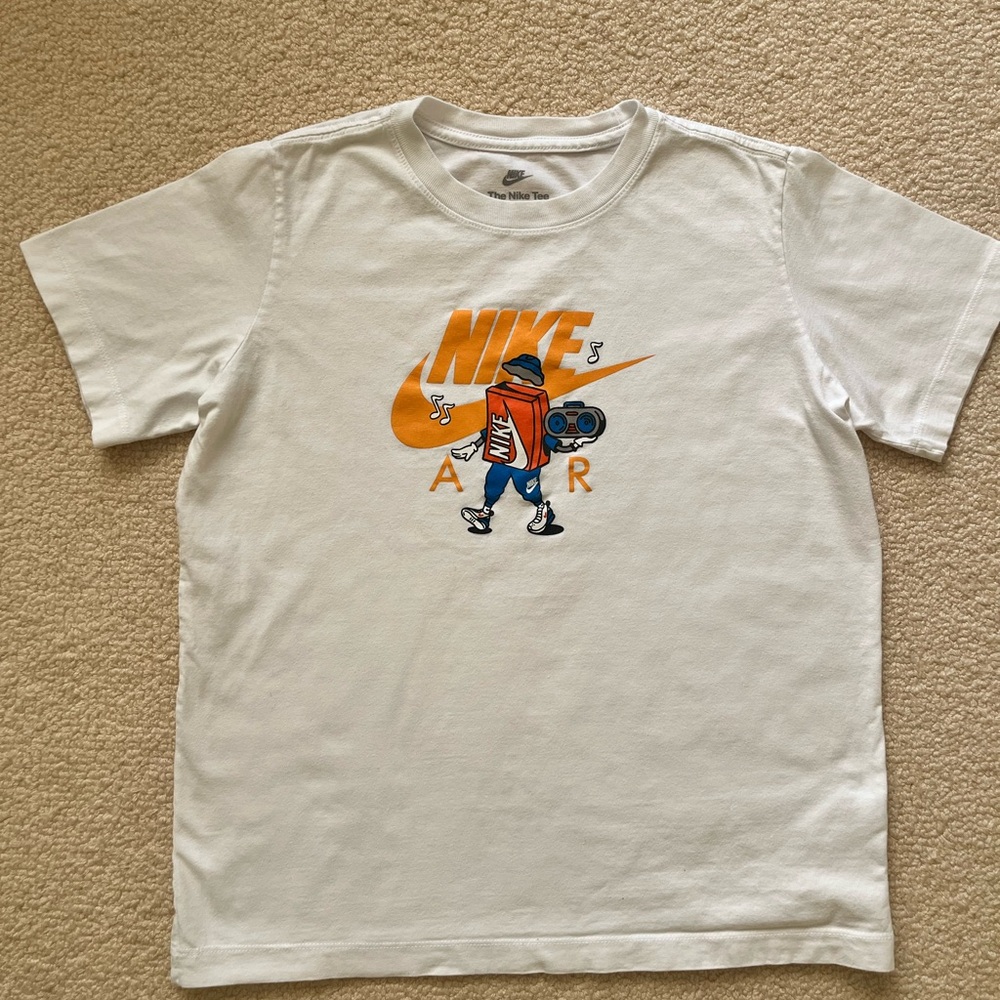 Nike Kids White Tee with Orange Logo and Graphic